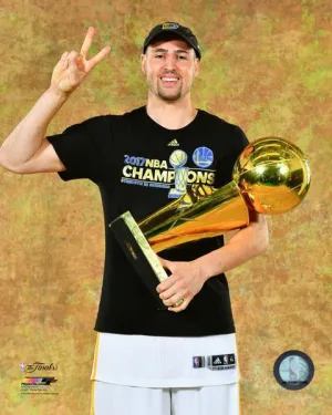 Klay Thompson with the 2017 NBA Championship Trophy Game 5 of the 2017 NBA Finals